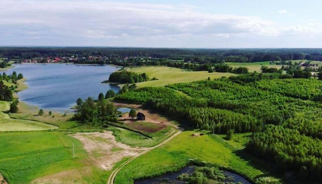 Między Olchami domek nad jeziorem. Noclegi całoroczne. Cisza, spokój. Barczewo Exterior foto